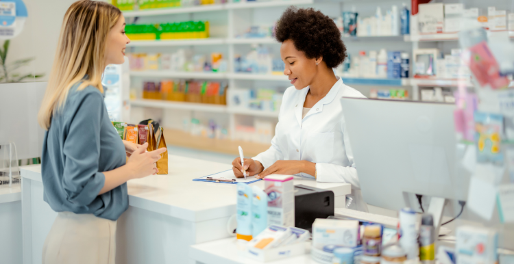 Woman being served in a pharmacy
