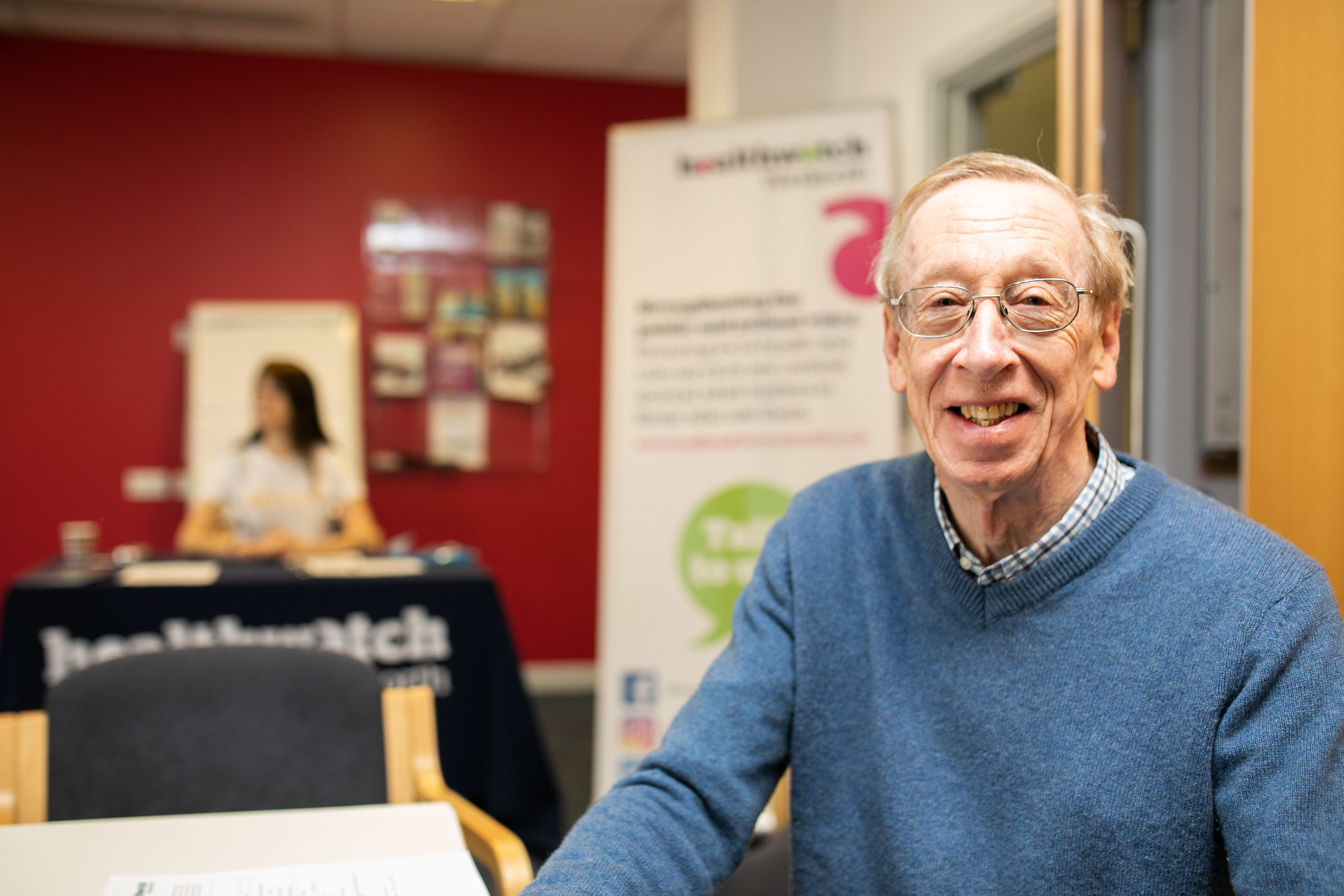 Man at a Healthwatch meeting looking at the camera