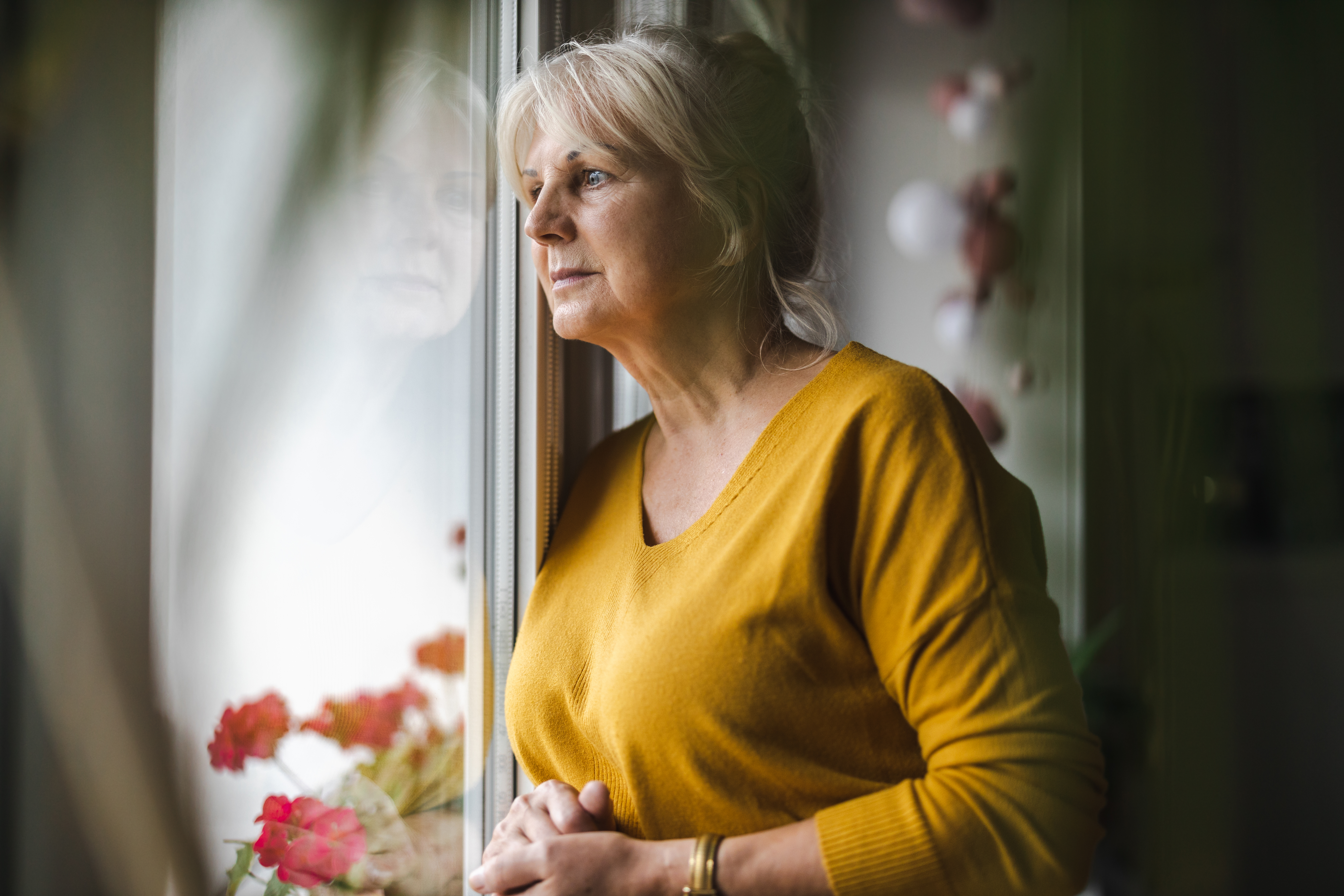 Woman looking out of the window