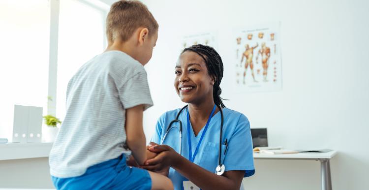 A female doctor with a young child