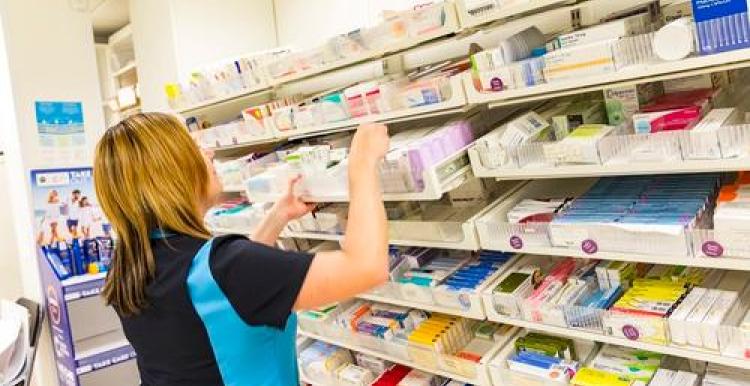 Woman working in a pharmacy