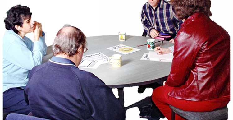 People sitting round a table People sitting round a table