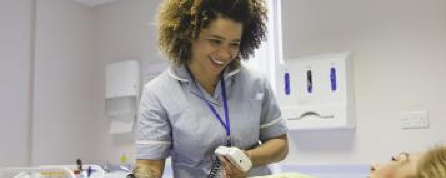 Nurse speaking to a patient