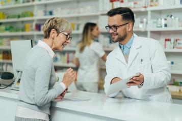 Pharmacist helping a women