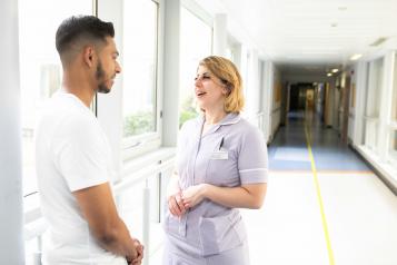 Nurse talking to a patient