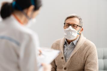 Nurse speaking to a patient