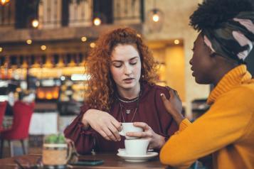 Two women talking to each other