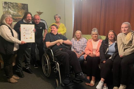 A group of people looking at the camera