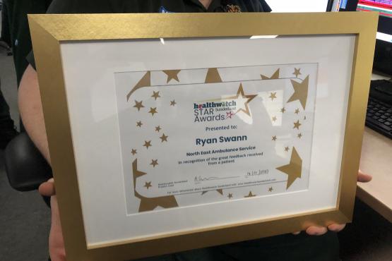 A person holding a certificate 