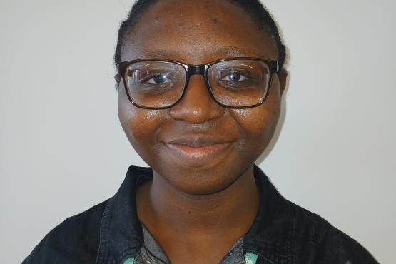 A young lady looking at the camera