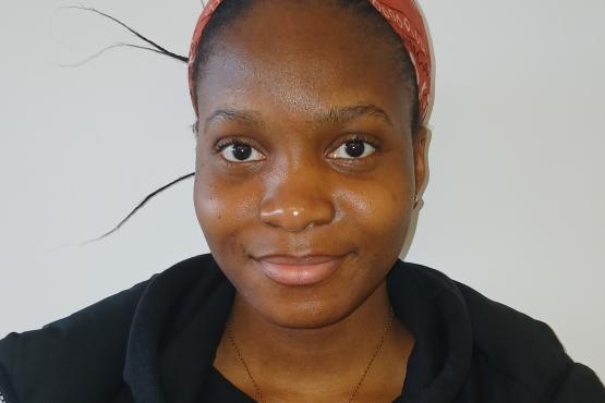 A young lady looking at the camera