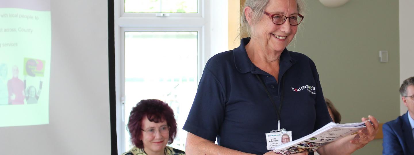 Healthwatch volunteer speaking at meeting