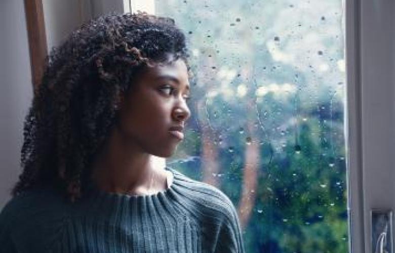 A woman looking out of the window