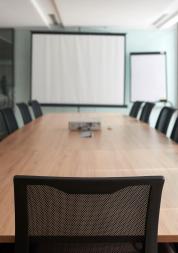 Meeting room with a table and chairs