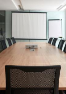 Meeting room with a table and chairs